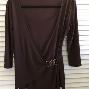 Brown wrap look top with hardware detail.